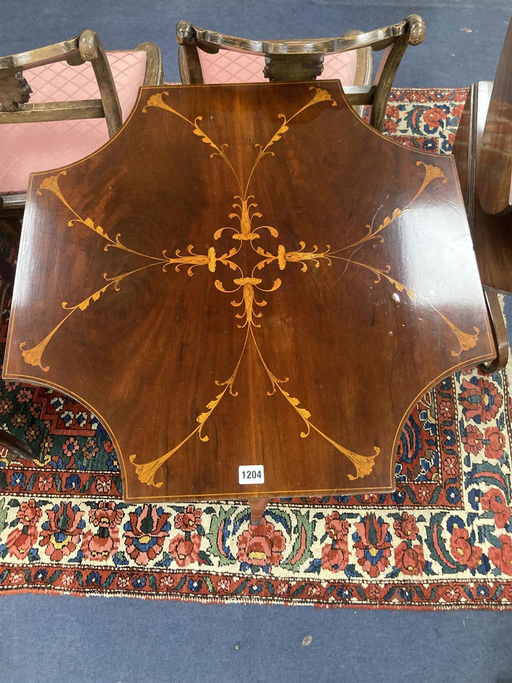 A Sheraton revival mahogany and marquetry inlaid octagonal centre table, width 68cm, depth 67cm, height 76cm